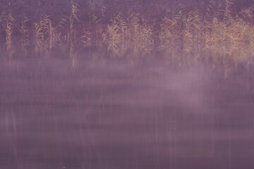 Landscape photo with fog running over the lake.
Mysterious feeling.