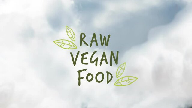 Animation of raw vegan food text over sky with clouds