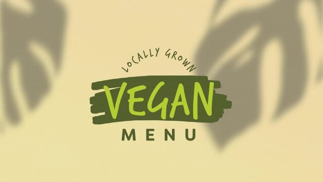Animation of locally grown vegan menu text over leaves shadow and yellow background