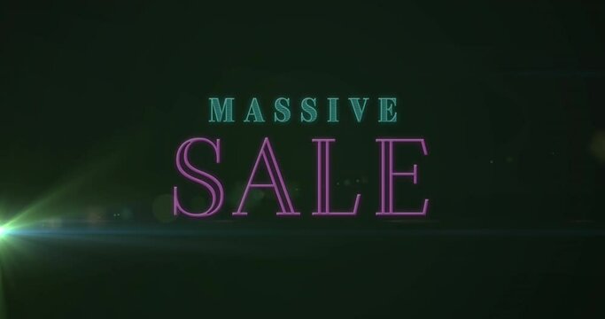 Animation of massive sale text banner against light spot on black background