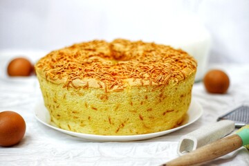 Homemade cheese sponge cake on a white background. circle cake.