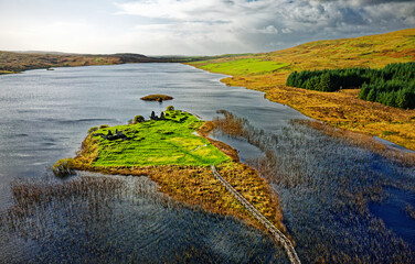 Finlaggan historic site on island of Eilean Mor in Loch Finlaggan, Islay, Inner Hebrides, Scotland. Seat of the Lords of the Isles and of Clan Donald © David Matthew Lyons
