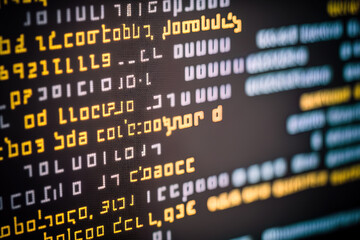 Obraz premium macro photo of computer screen with program source code and highlighted spyware inscription in the. Generative AI