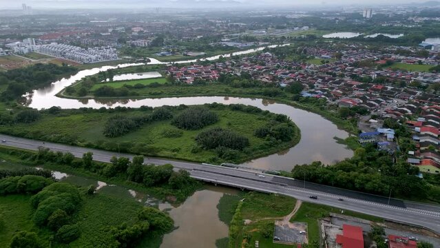Aerial fly over bridge cross curve river Sungai Juru, Bukit Mertajam