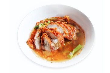 Fried Chicken Tom Yum Noodles Put the chopped fried chicken into pieces. Thai street food 
