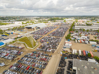Aerial photo salvage junk yar full of totaled cars