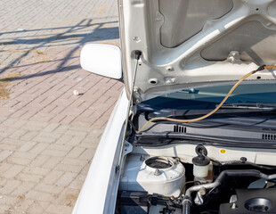 Car hood support rod closeup