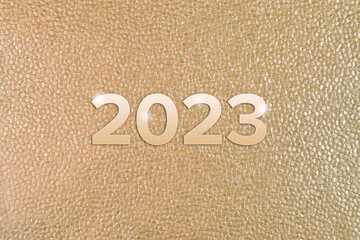 2023 New Year Lettering on Textured Gold Background