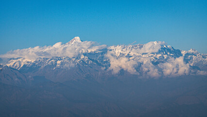 Panoramic beautiful view of mount Trisul, Nanda Devi with the beautiful sky on the way to Binsar, Kasardevi, Almora Uttarakhand 