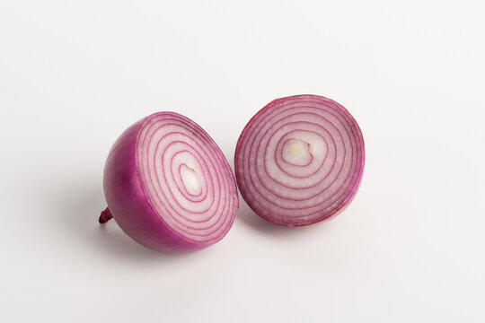 red onion slices on white background.