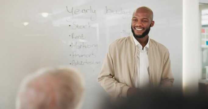 Business people, meeting and presentation for budget, finance and planning for marketing company. Black man, financial leader or manager by board, writing or workshop for corporate planning in office