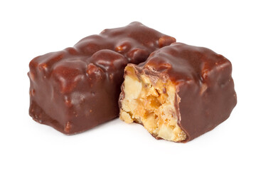 Chocolate candies with nuts on a white background.