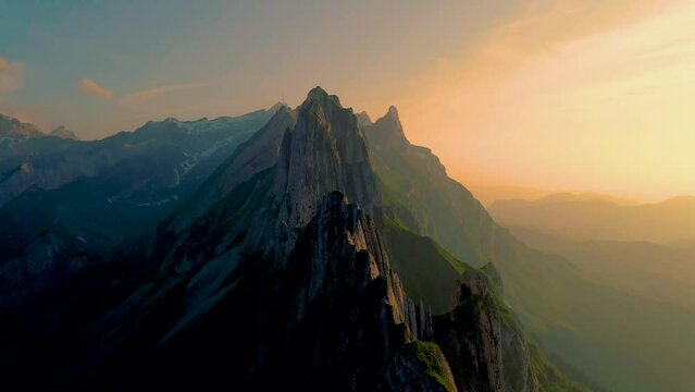 sunset at Schaeffler mountain ridge swiss Alpstein, Appenzell Switzerland, a steep ridge of the majestic Schaeffler peak, Switzerland. 