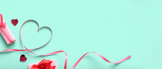 Heart made of ribbon and gifts on turquoise background with space for text. Valentine's Day...