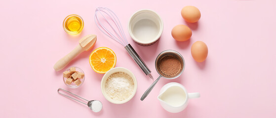 Set of kitchen utensils and ingredients for preparing bakery on pink background