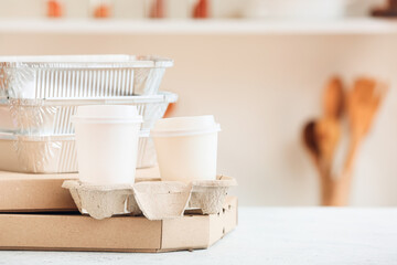 Fototapeta na wymiar Set of different food delivery containers on white table