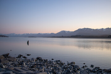 Sunrise at the edge of Lake Tekapo, New Zealand