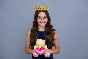 Birthday kids prom party. Teen child in queen crown isolated on gray background. Princess girl in...