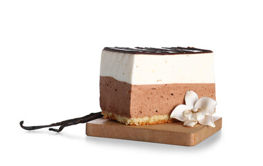 Board with piece of birds milk cake and vanilla isolated on white background