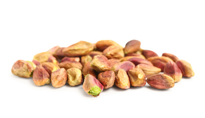 Heap of tasty pistachio kernels isolated on white background
