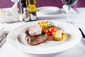 steak with grilled vegetables and wine