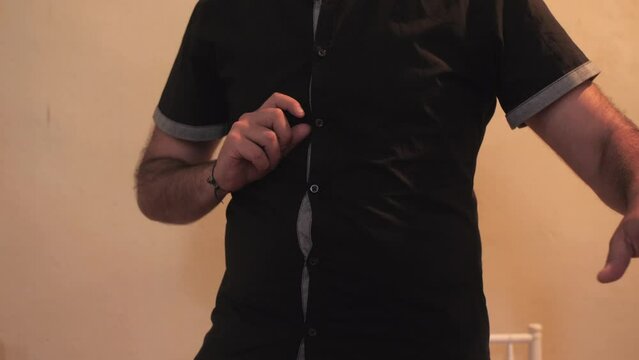 medium shot of musician playing mysterious theremin instrument indoor