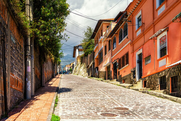 street in old town Quito. Colonial style buildings.
