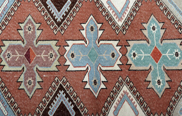 Textures and patterns in color from woven carpets