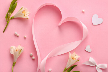 Naklejka na ściany i meble Heart made of ribbon, beads and flowers on pink background. Valentine's Day celebration