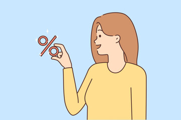 Smiling woman hold percentage symbol
