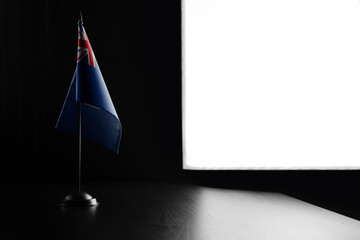 Small national flag of the Anguilla on a black background