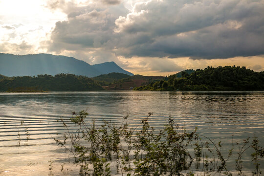 Beautiful wallpaper of the nam ngum lake in Laos close  to Luang Prabang. Travel to wildlife Asia with boat