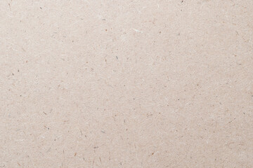 Particleboard, chipboard background with grainy texture of Medium Density Fiberboard (MDF), particle presses wooden panel or OSB Oriented strand board in light beige brown cream sepia color - obrazy, fototapety, plakaty