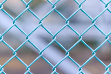 Naklejka premium 淡い緑色の金網のパターン