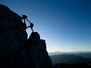 the activity that mountaineers who help together successfully and harmoniously