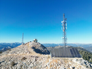 dominance fire watchtower and signal emitters at mountain peak