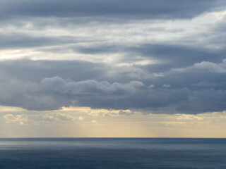 Low storm clouds over Tasman sea coast
