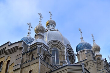 domes of the temple of St.Panteleimon in hoarfrost against the background of the winter sky