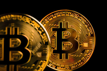 Bitcoin Crypto currency Gold Bitcoin BTC Bit Coin close up of Bitcoin coins isolated on black background Blockchain technology, bitcoin mining concept