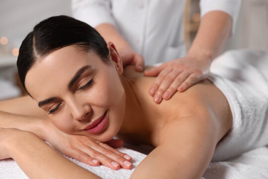 Beautiful Woman Receiving Back Massage In Beauty Salon, Closeup