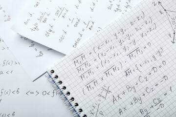 Fototapeta premium Sheets of paper with different mathematical formulas, top view