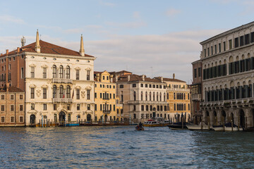 Naklejka premium Beautiful old Venetian facades and boats in Venice, Italy