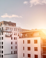 New modern apartment complex. Low-rise European apartment building complex with outdoor facilities.