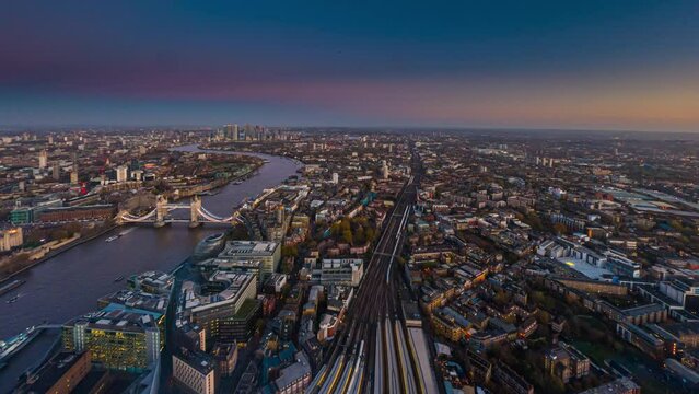 Central London aerial view time lapse. London Nightlife Time-Lapse. Time-lapse of trains in London. Time Lapse London Aerial View from The Shard to Tower Bridge. 
