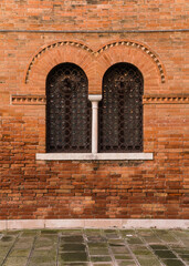 Architectural detail of an old Venetian facade in Venice, Italy