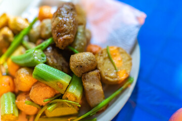 close-up Vietnamese food. Delicious homemade fried fish balls on table. popular street food of vietnam. Selective focus