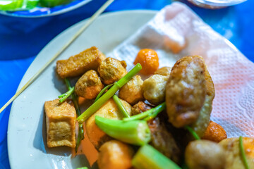 close-up Vietnamese food. Delicious homemade fried fish balls on table. popular street food of vietnam. Selective focus