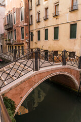 Fototapeta na wymiar Closeup detail of a beautiful old bridge in Venice, Italy