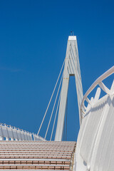 suspension bridge with stairs in the blue sky