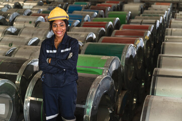 Portrait African American engineer woman with metal sheet at factory	